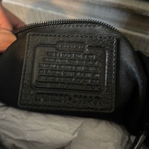 Black on black fabric Coach so pretty and roomy, I loved it!